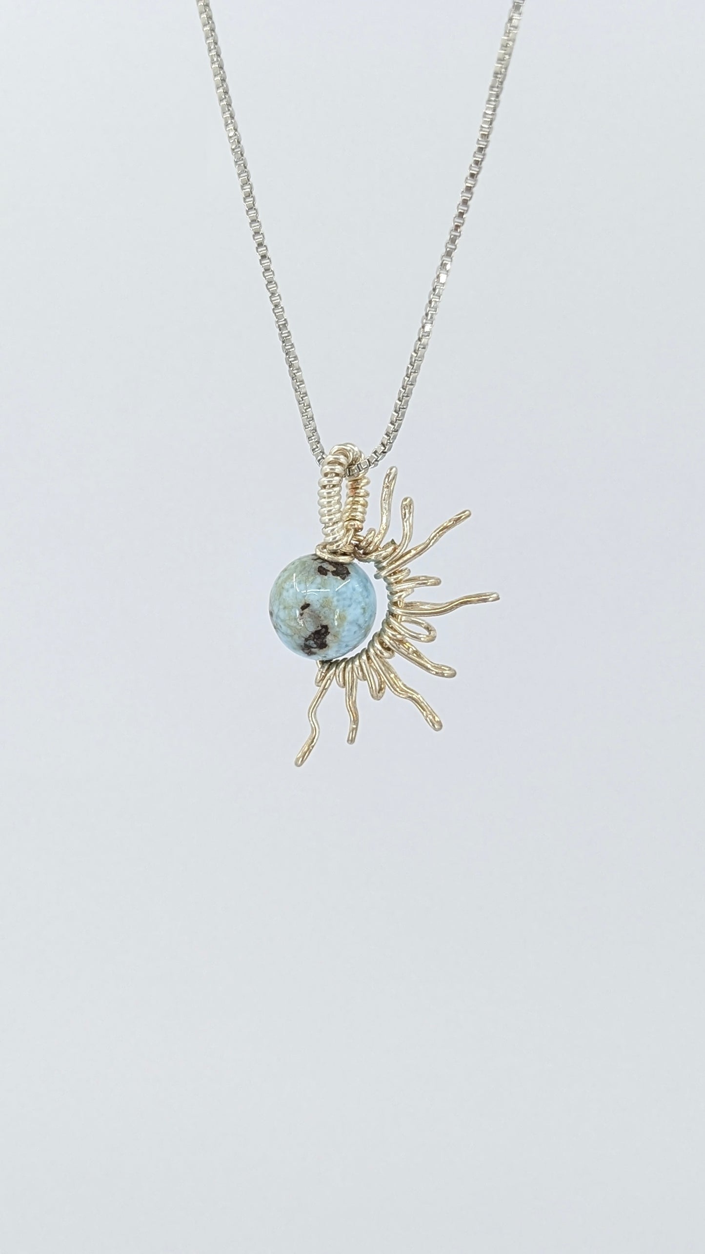 Handcrafted half sun pendant necklace with Larimar stone on a silver-tone adjustable chain