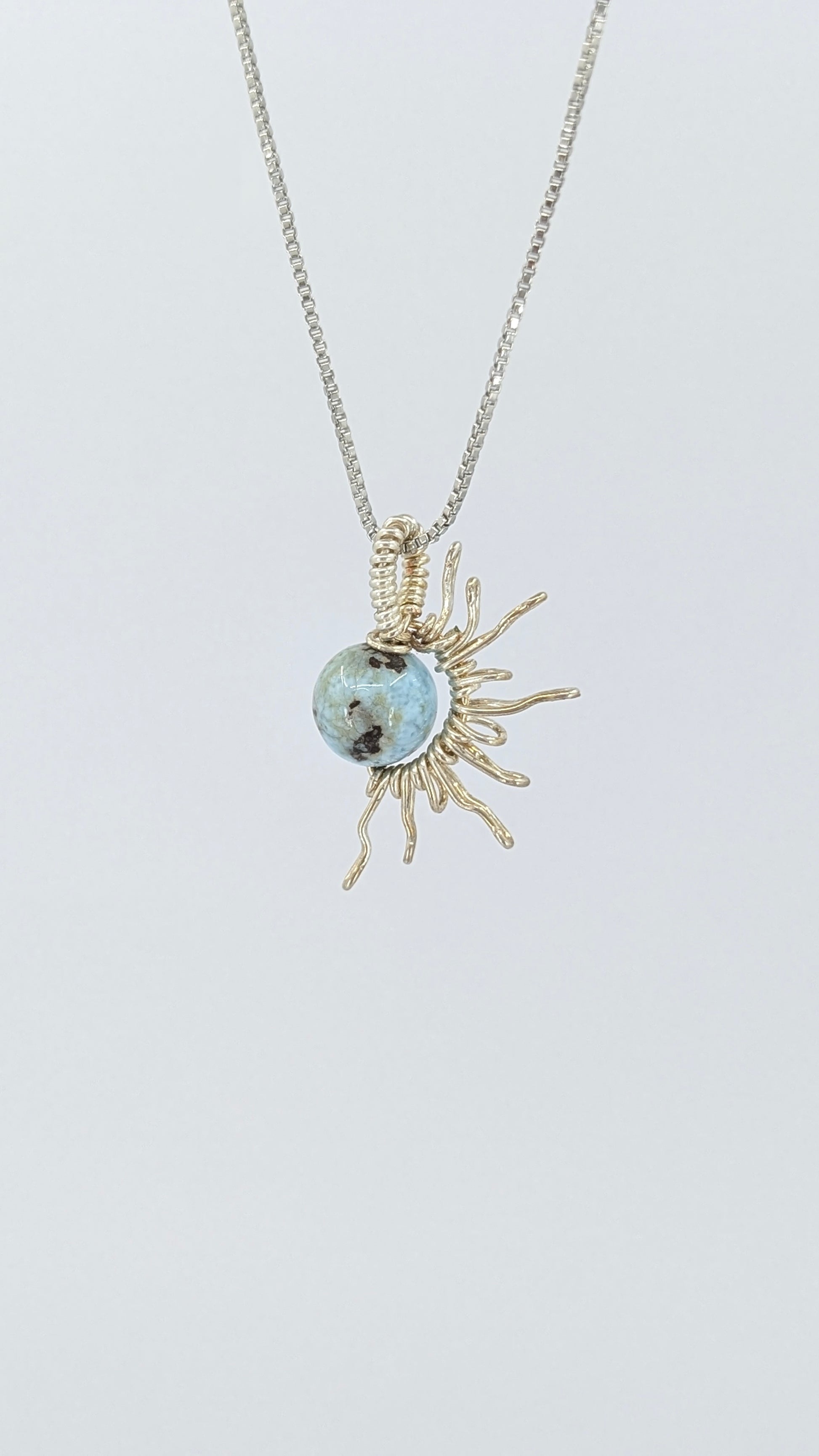 Handcrafted half sun pendant necklace with Larimar stone on a silver-tone adjustable chain