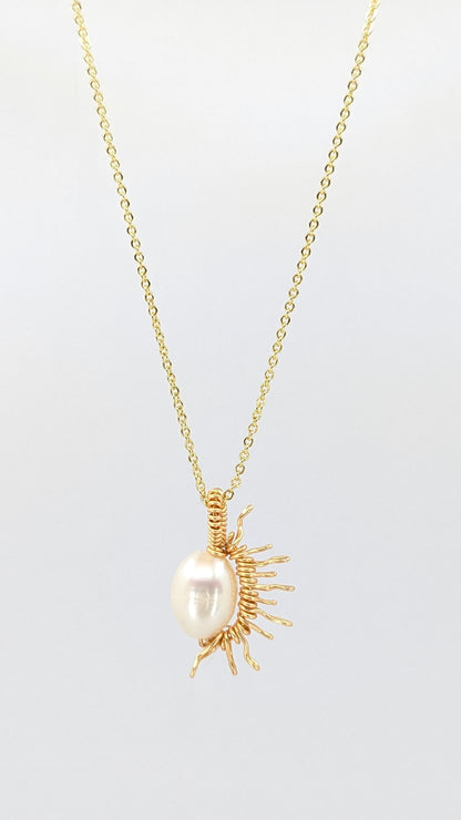 Handcrafted half sun pendant necklace with freshwater pearl on a gold-tone adjustable chain