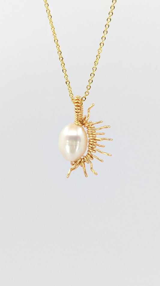 Handcrafted half sun pendant necklace with freshwater pearl on a gold-tone adjustable chain