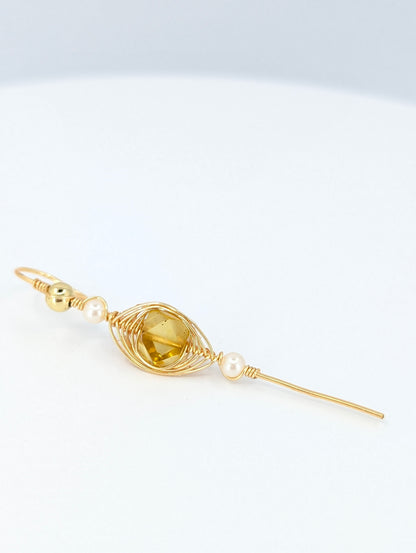 Amber halo ear pin
