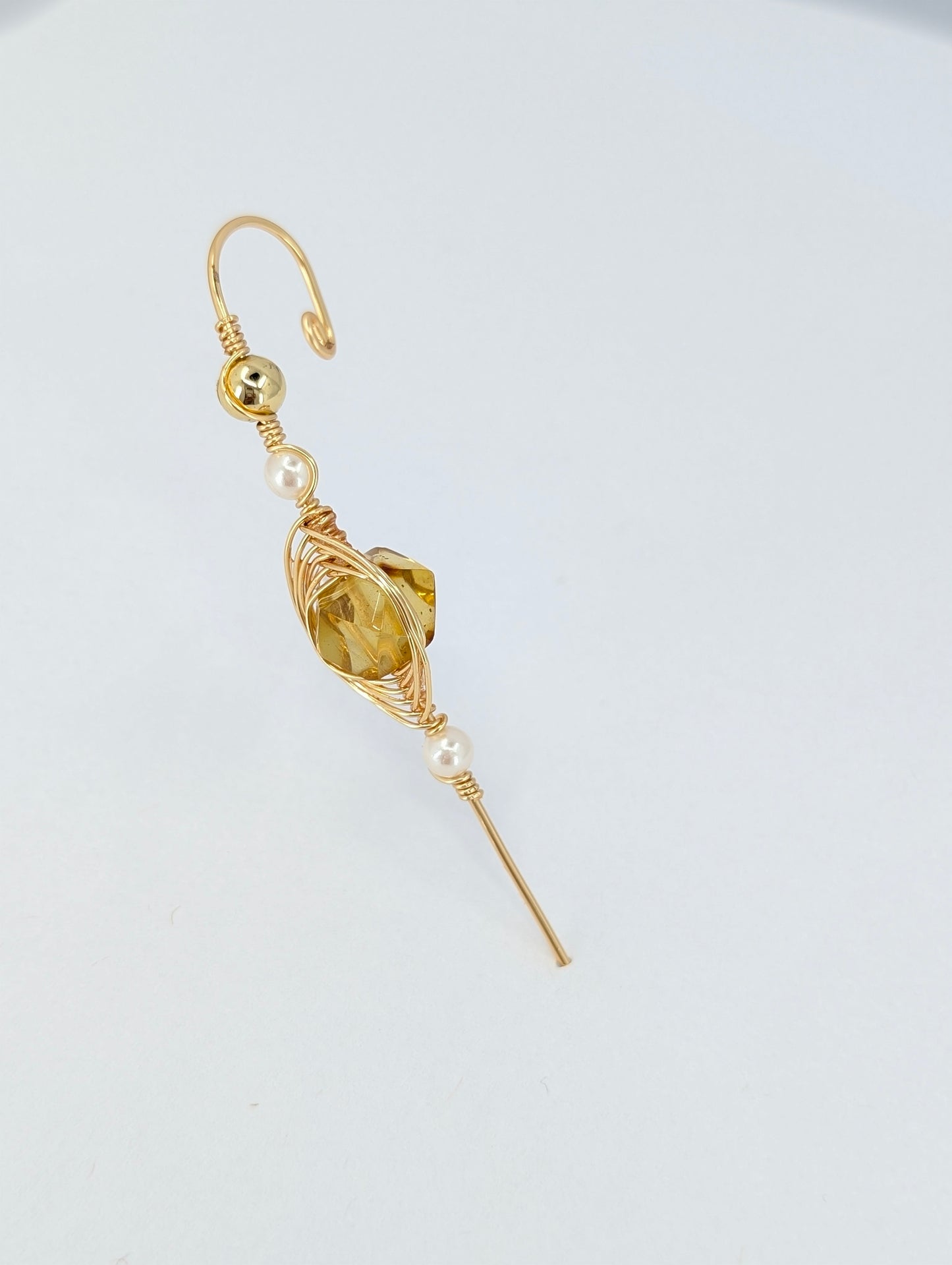 Amber halo ear pin