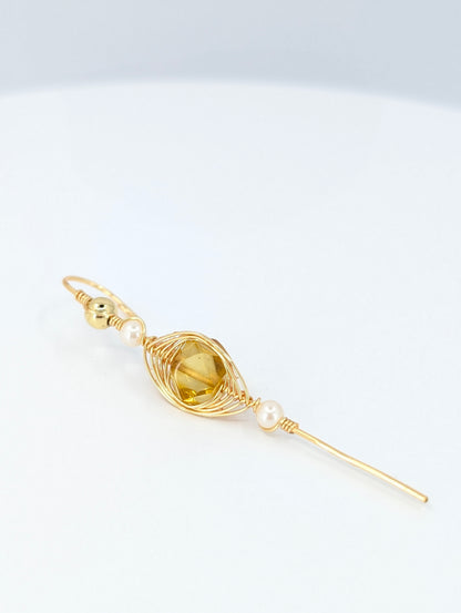 Amber halo ear pin