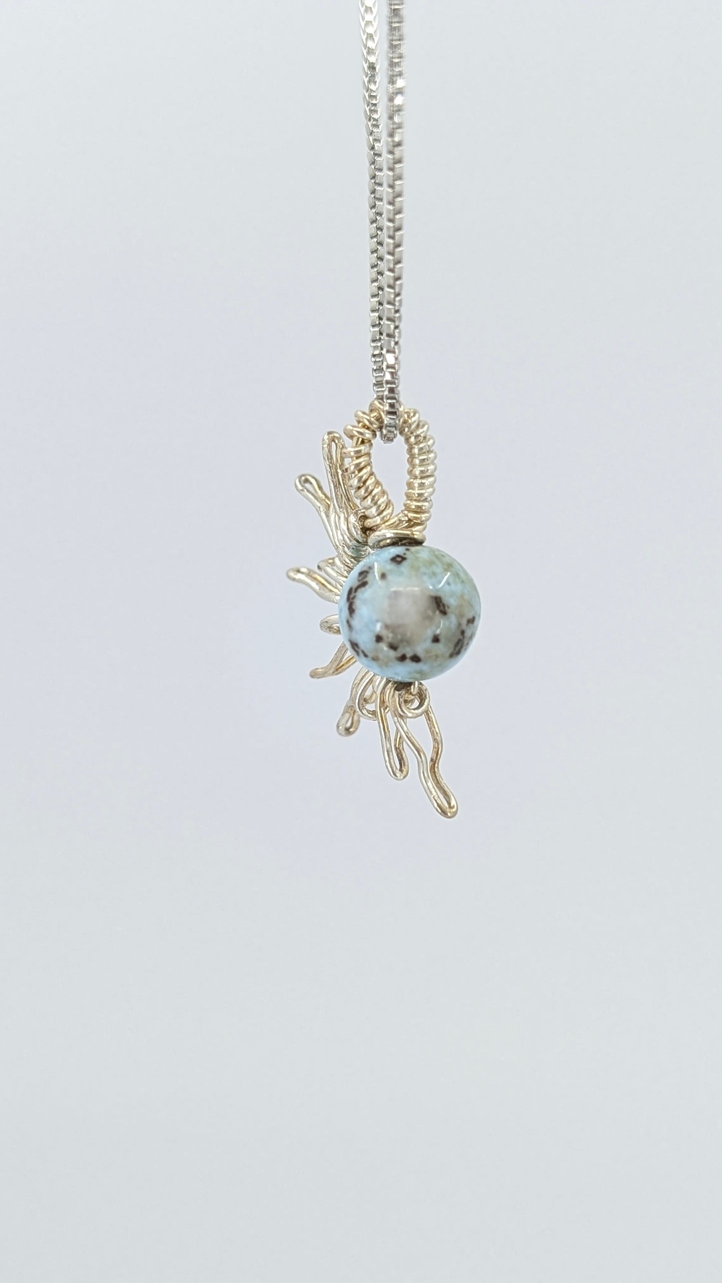 Handcrafted half sun pendant necklace with Larimar stone on a silver-tone adjustable chain
