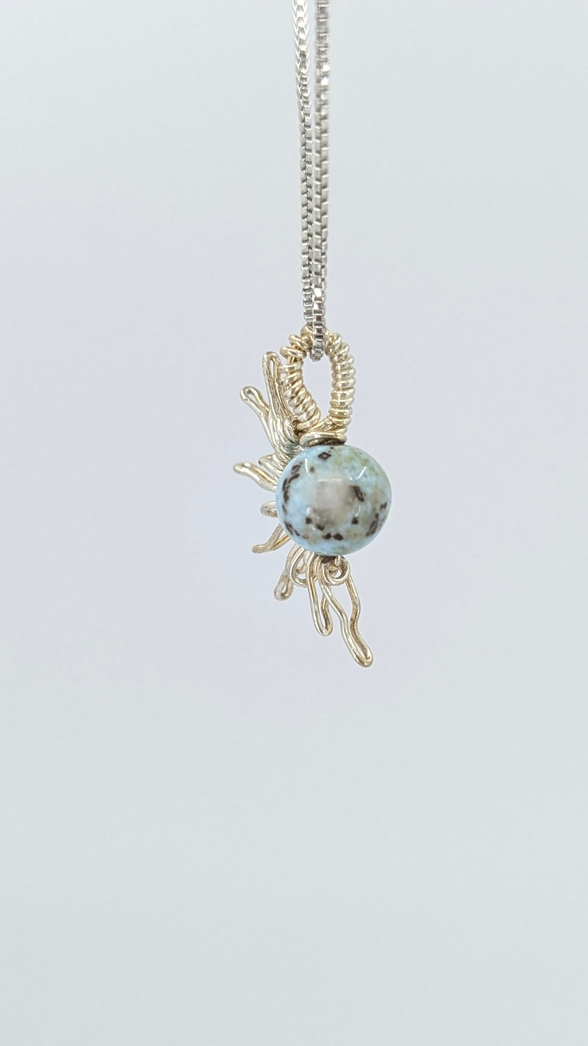 Handcrafted half sun pendant necklace with Larimar stone on a silver-tone adjustable chain