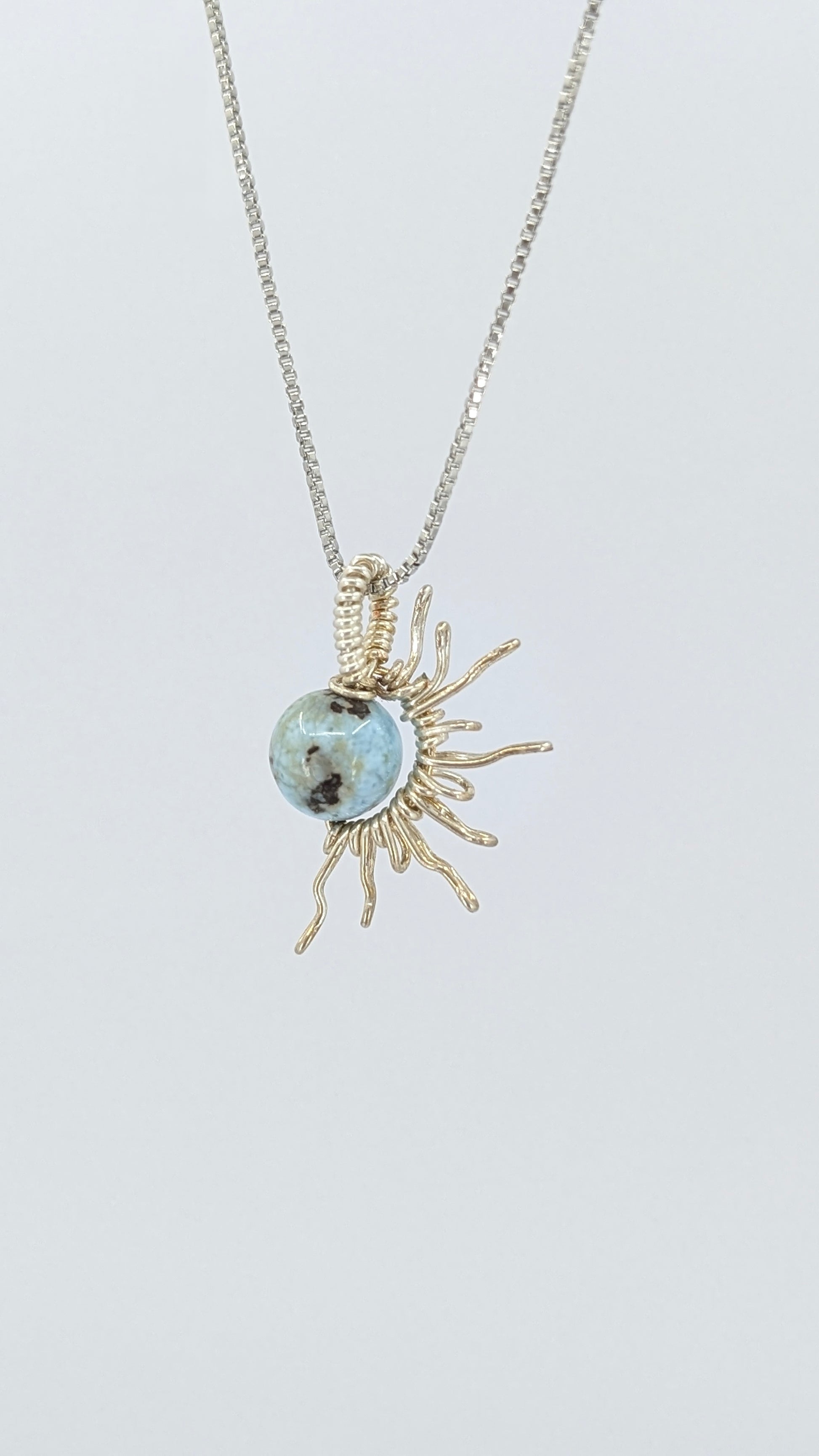 Handcrafted half sun pendant necklace with Larimar stone on a silver-tone adjustable chain