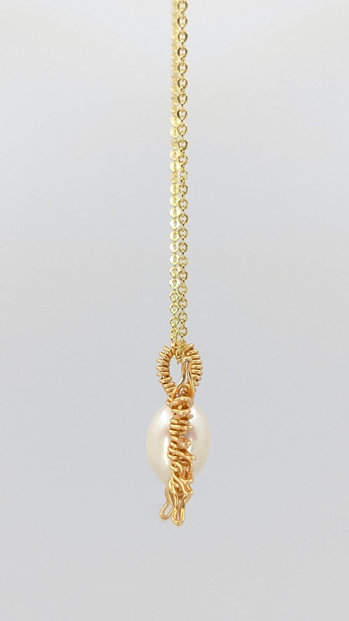 Handcrafted half sun pendant necklace with freshwater pearl on a gold-tone adjustable chain