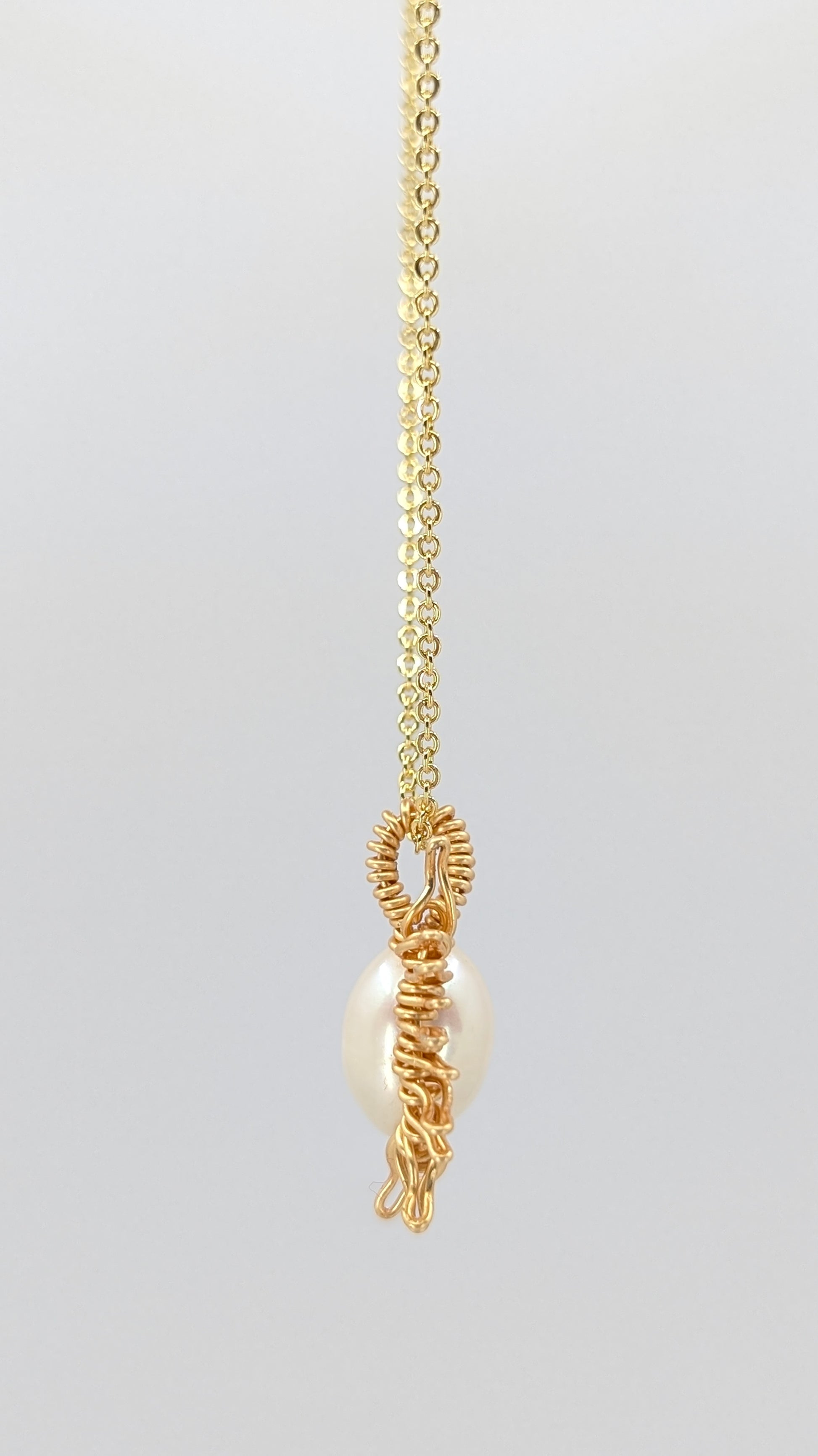 Handcrafted half sun pendant necklace with freshwater pearl on a gold-tone adjustable chain